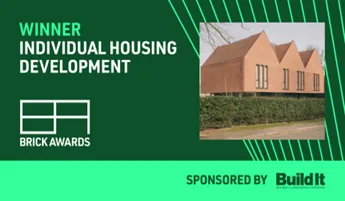 a green business card with a picture of a house